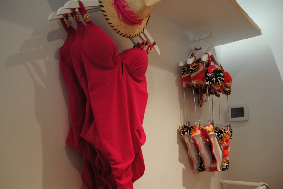 Pretty Natori swimwear displayed on the wall.