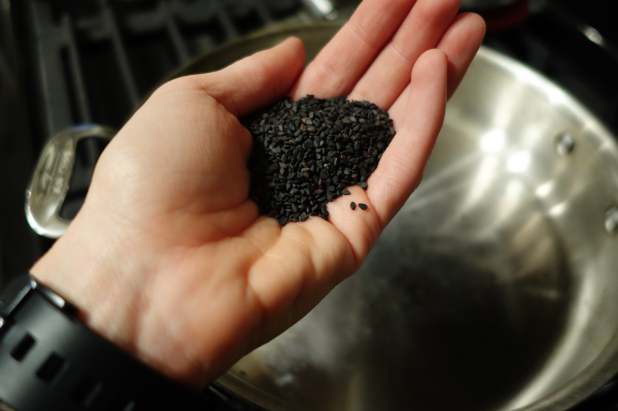 Handful of black sesame seeds. 
