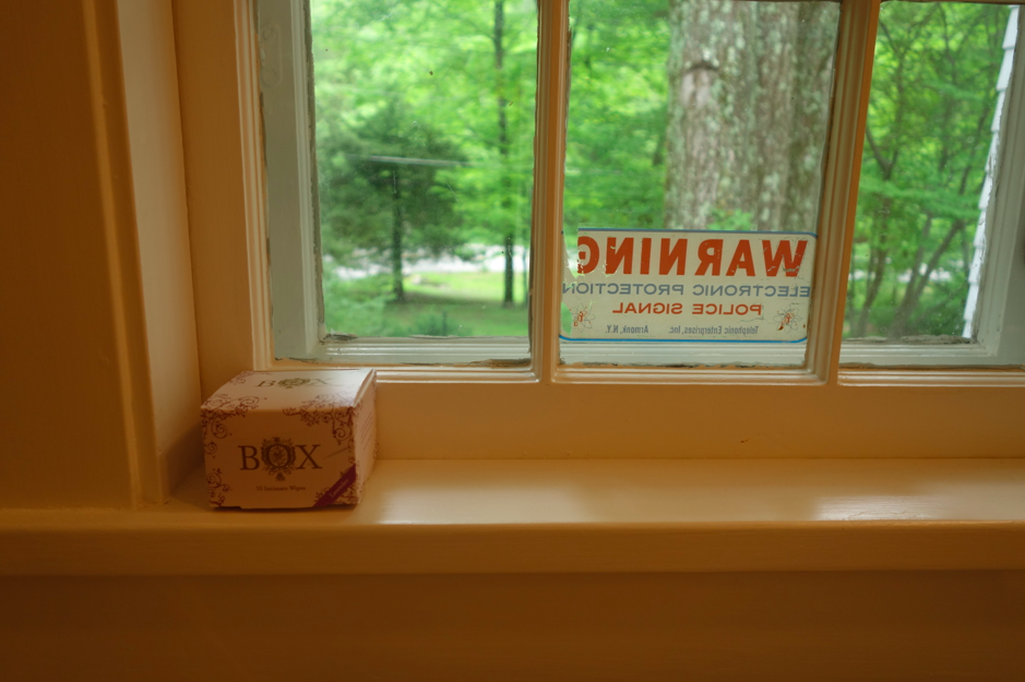 Pretty box in window. Discrete and beautiful.