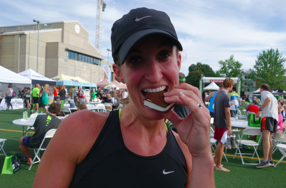 My friend Katy (#1 tennis player from my High School team) pushed me through the race and was awesome to run with. Thank you! And here she is gobbling up an ice cream sandwich, because WHY NOT?