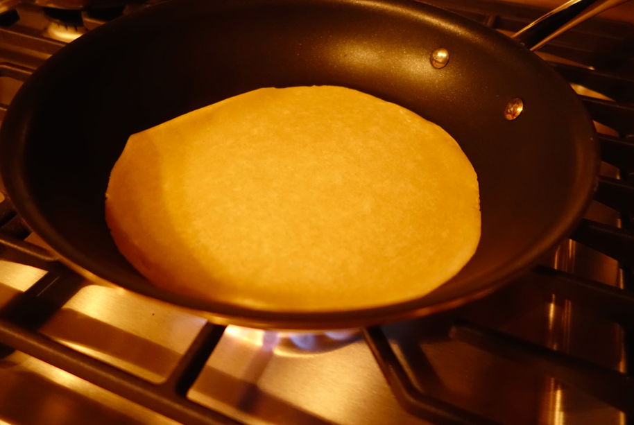 No butter or oil on the pan, simply place the raw tortilla on the hot pan for 60 seconds and flip!