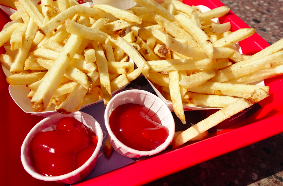 We took the 6 am flight out on Friday morning (after our son's school's benefit the night before). So what is better than eating a big pile of french fries immediately after the flight. At 10 am.