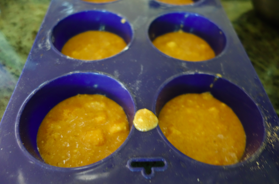 In the silicone jumbo tins, add 1/4 cup of the batter.