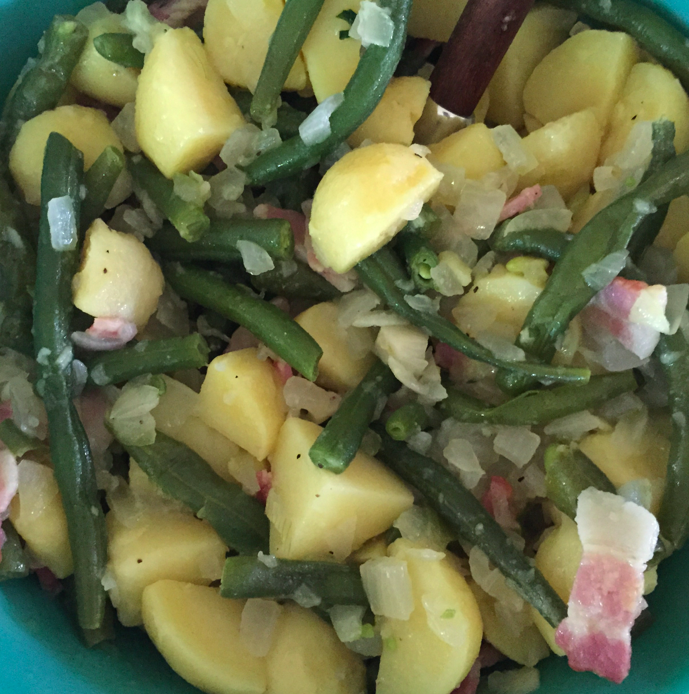 Potato Green Bean salad with sauteed onions and bacon.