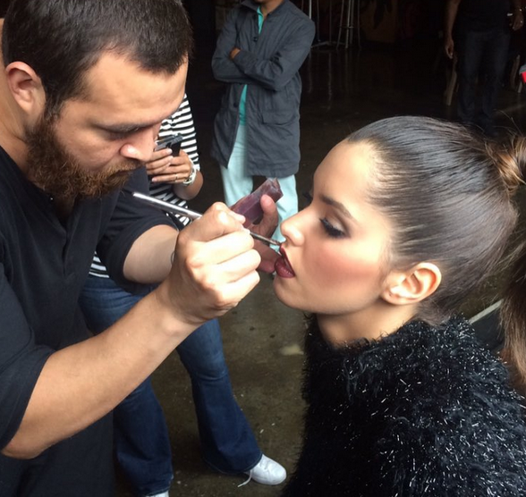 Oscar! Applying makeup to Miss Honduras.