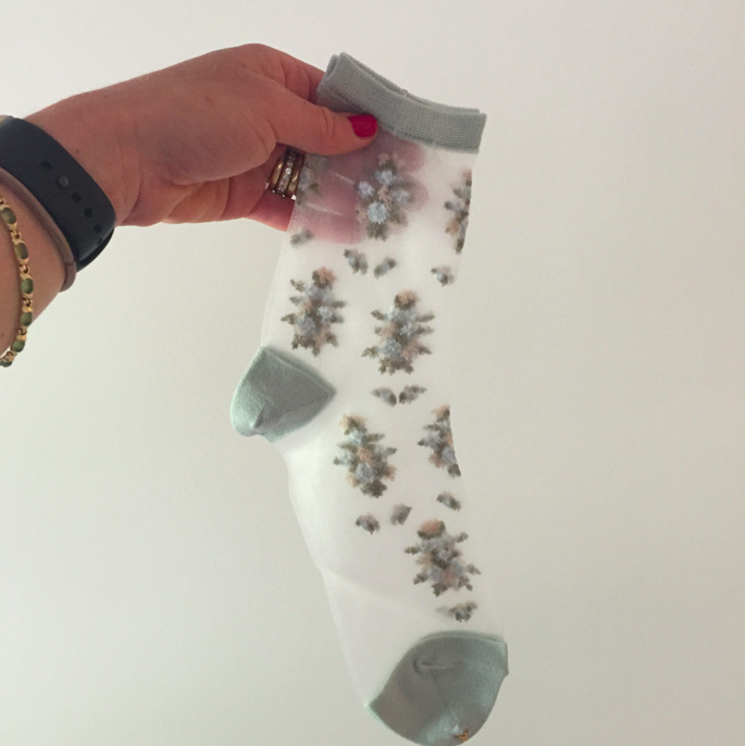 A creative pair that is transparent with flowers. Love both of those qualities of the socks!