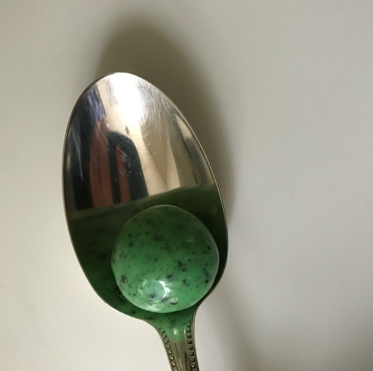 Size comparison, in a spoon.