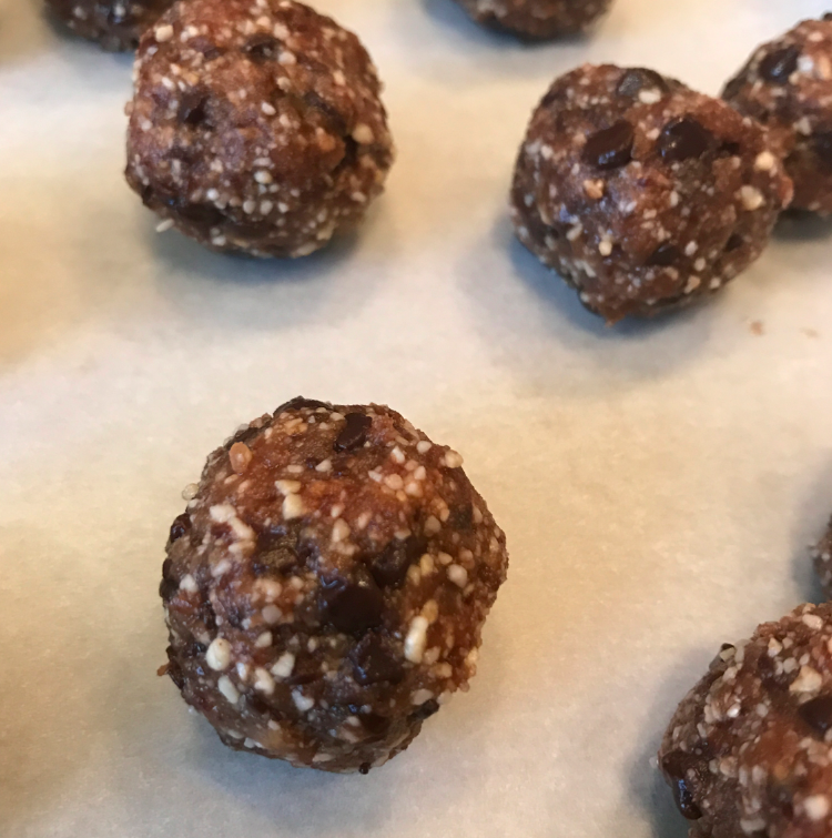 Roll into balls. Place them on a pan lined with parchment paper.