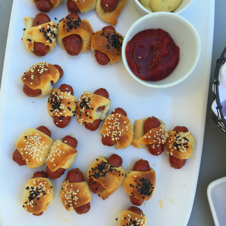 Homemade pigs in a blanket. And yes, with sprinkles of seeds.