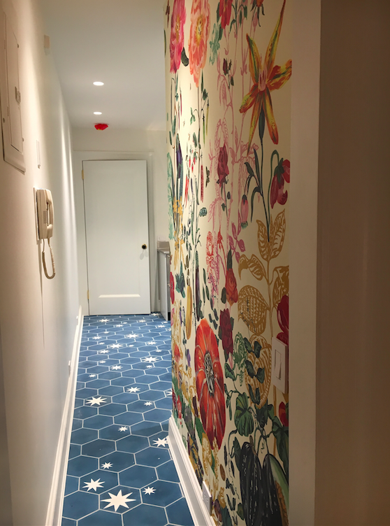 My favorite room EVER is the mud room / laundry room. I am obsessed with this wallpaper, the tiles, everything -- and yes, that is a phone attached to the wall (for the doormen to call up) and we will be updating the phone STAT.
