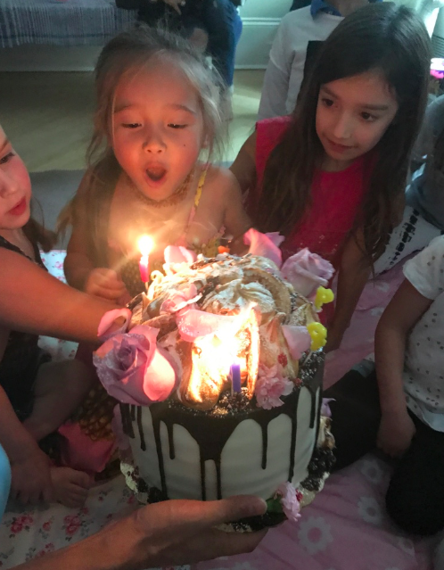 Birthday babe and her cake. 