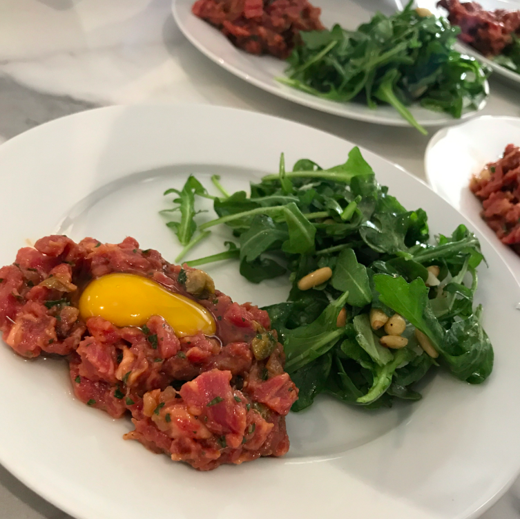 Steak tartare is not exactly what I was thinking of learning how to make, but how amazing is this plate of food that a friend cooked up?